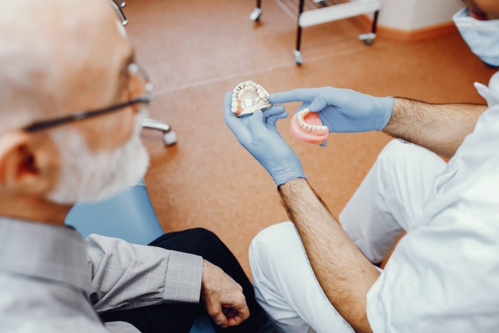 dental implants vs dentures pros and cons marketfair dental care